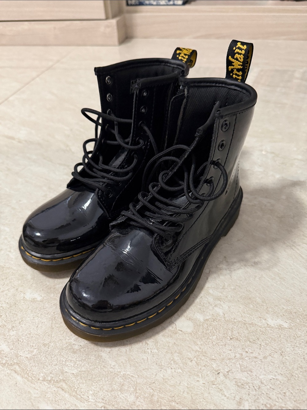 Dr. Martens Black Patent Lace-Up Combat Boots with Yellow Stitching